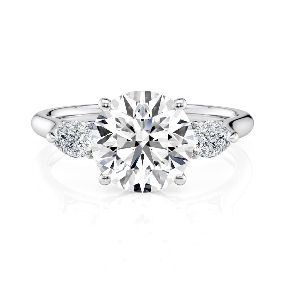 18K White Gold Round and Pear Flush Fit Three Stone