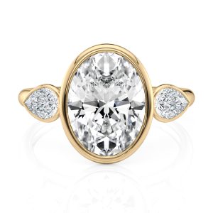 14K Yellow Gold Three stone bezel set with Pears