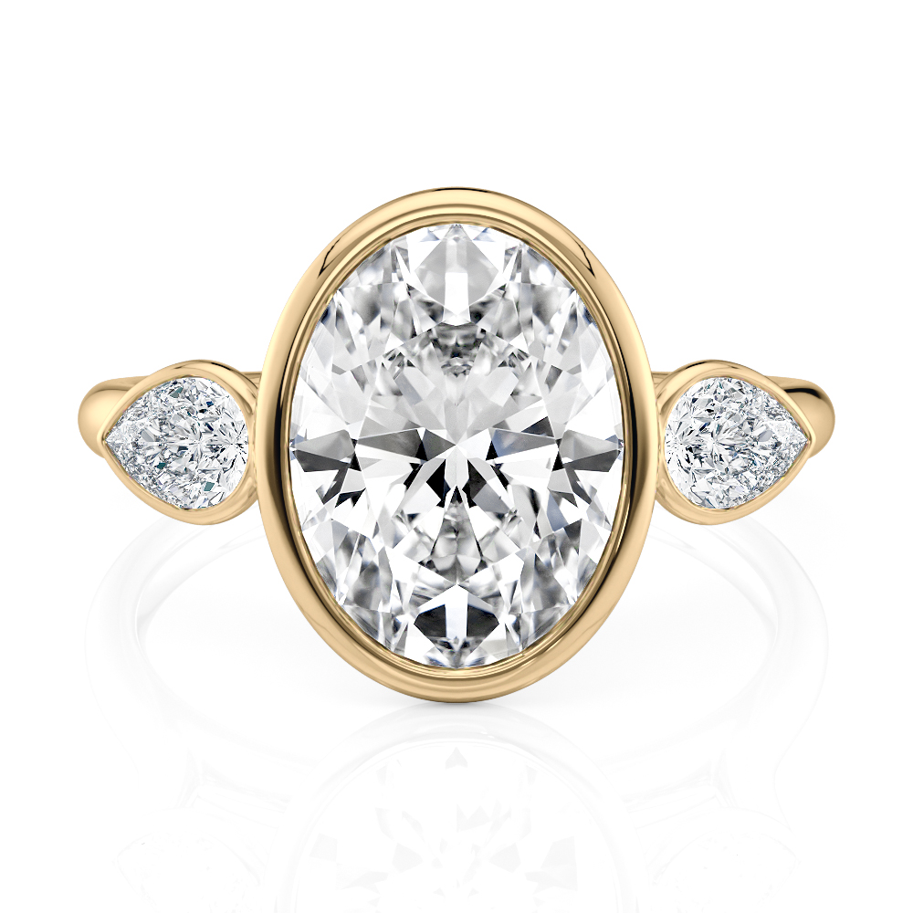 14K Yellow Gold Three stone bezel set with Pears